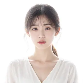 A high-key portrait of a person against a bright white backg