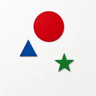 A large red circle, a small blue triangle, and a medium gree