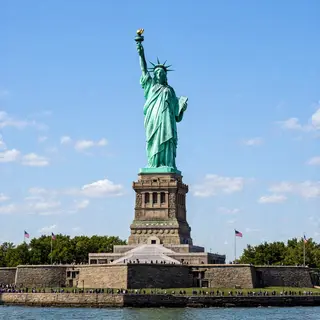 The Statue of Liberty on her island pedestal, with correct t