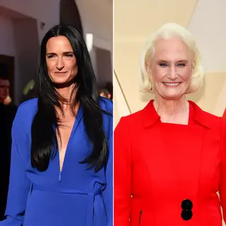 Two women standing side by side: one with short blonde hair 