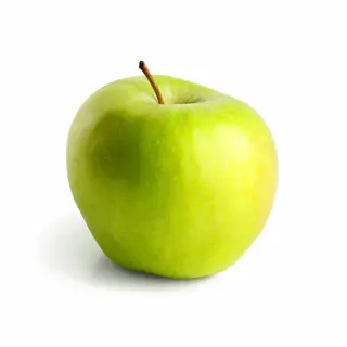 A ripe green apple on a seamless white background with soft 