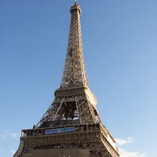 The Eiffel Tower in Paris on a clear day, architecturally ac