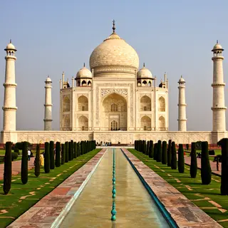 The Taj Mahal in Agra seen from the reflecting pool, with ac