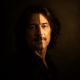 A portrait lit with classic Rembrandt lighting — triangle of