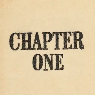 The word 'CHAPTER ONE' typed on aged paper with a vintage ty