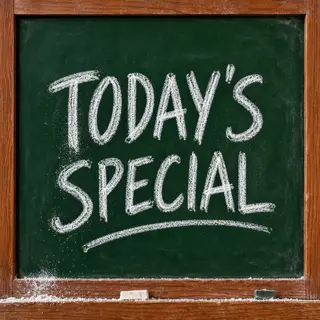 The phrase 'TODAY'S SPECIAL' written in white chalk on a dar