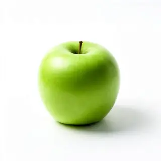 A ripe green apple on a seamless white background with soft 
