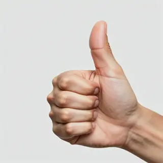 A hand giving a thumbs-up with four fingers curled and thumb