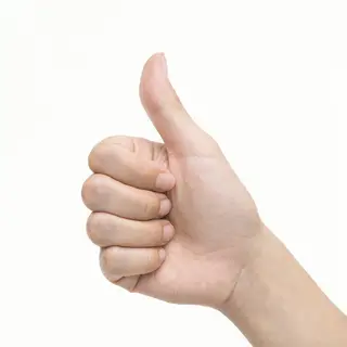 A hand giving a thumbs-up with four fingers curled and thumb