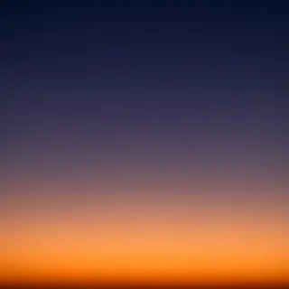 A sunset sky gradient on a flat surface from #FF6B35 (orange