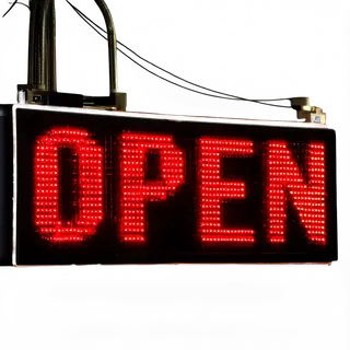 The word 'OPEN' displayed on a red LED sign with glowing pix