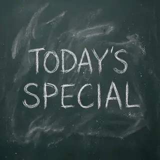 The phrase 'TODAY'S SPECIAL' written in white chalk on a dar