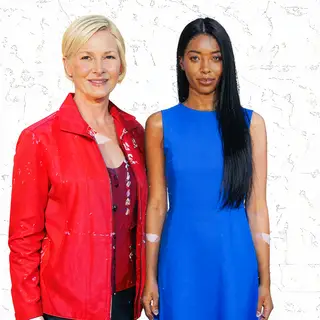 Two women standing side by side: one with short blonde hair 