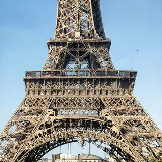 The Eiffel Tower in Paris on a clear day, architecturally ac