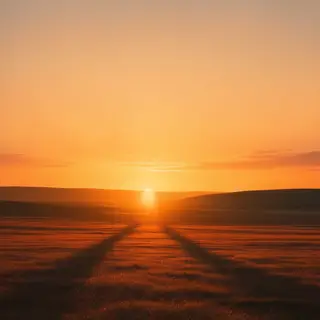 A landscape photograph bathed in golden hour light — long wa