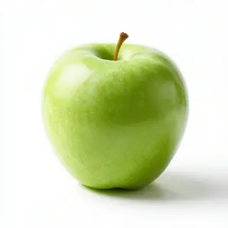 A ripe green apple on a seamless white background with soft 