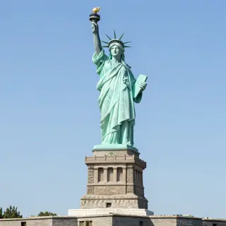 The Statue of Liberty on her island pedestal, with correct t
