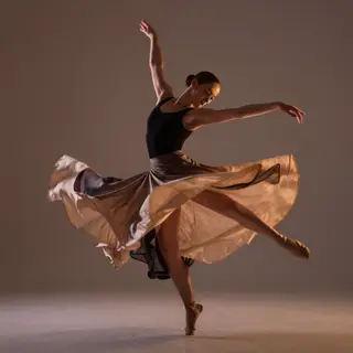 A dancer in a dynamic spin, dress flowing outward with one l