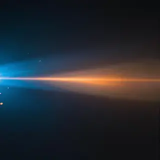 A cinematic frame with blue and orange anamorphic lens flare