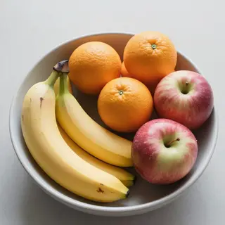 A fruit bowl containing exactly 3 bananas, 4 oranges, and 2 