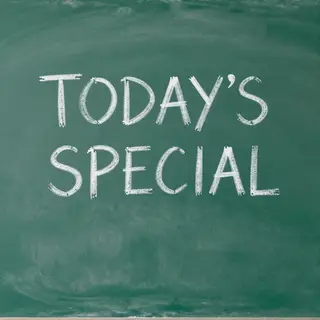 The phrase 'TODAY'S SPECIAL' written in white chalk on a dar