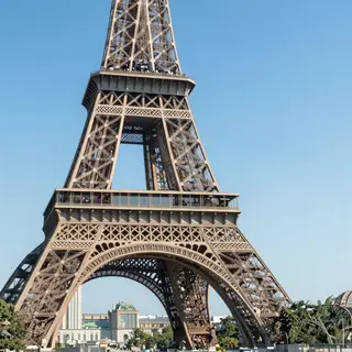 The Eiffel Tower in Paris on a clear day, architecturally ac