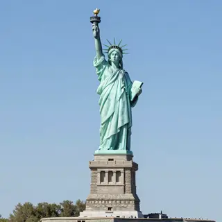 The Statue of Liberty on her island pedestal, with correct t