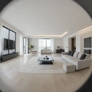 A wide-angle shot of a modern living room interior showing e