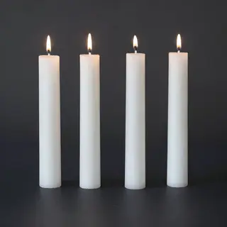 Exactly 4 white candles standing on a dark surface