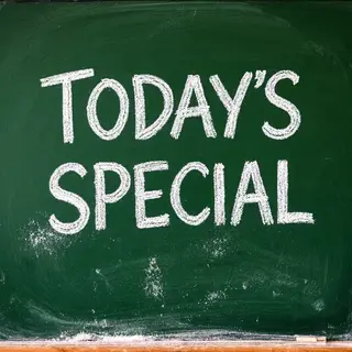 The phrase 'TODAY'S SPECIAL' written in white chalk on a dar