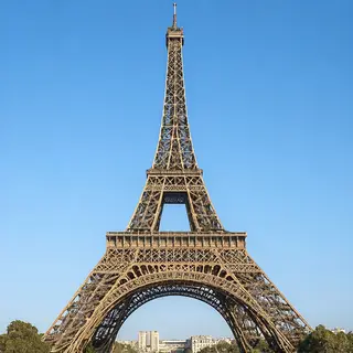 The Eiffel Tower in Paris on a clear day, architecturally ac