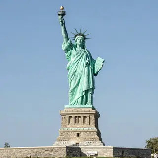 The Statue of Liberty on her island pedestal, with correct t