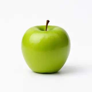 A ripe green apple on a seamless white background with soft 