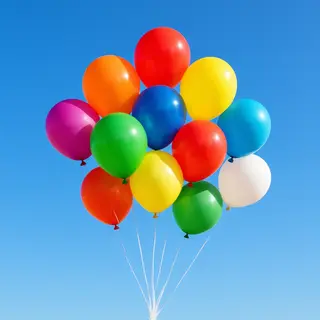 Exactly 11 colorful balloons floating against a clear blue s