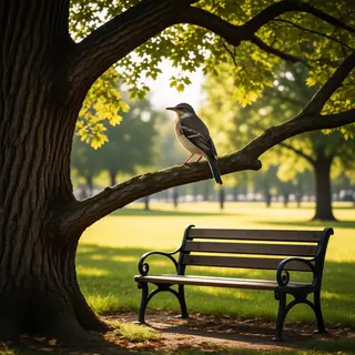 A bird perched on a branch, the branch extending from a tree