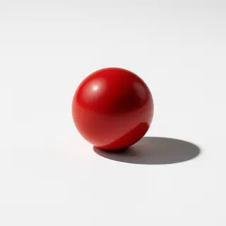 A red sphere on a white surface with a single shadow cast to