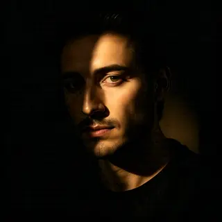 A portrait lit with classic Rembrandt lighting — triangle of