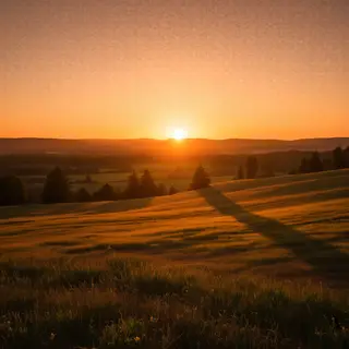 A landscape photograph bathed in golden hour light — long wa