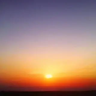 A sunset sky gradient on a flat surface from #FF6B35 (orange