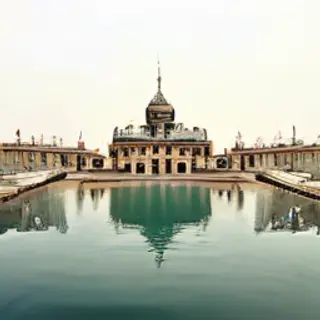 The Taj Mahal in Agra seen from the reflecting pool, with ac