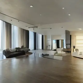 A wide-angle shot of a modern living room interior showing e