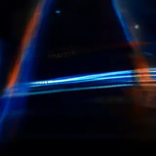 A cinematic frame with blue and orange anamorphic lens flare