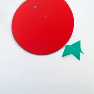 A large red circle, a small blue triangle, and a medium gree