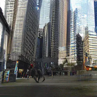 A giant tabby cat walking between city skyscrapers like a ka