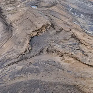 A cross-section showing tectonic plates at a convergent boun