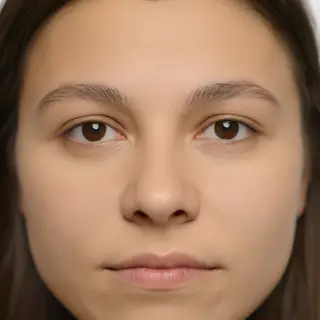 A human face with eyes, nose, and mouth but no eyebrows