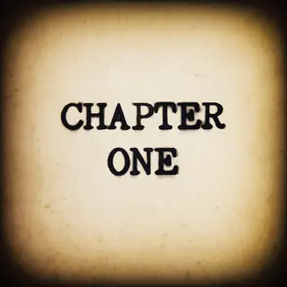 The word 'CHAPTER ONE' typed on aged paper with a vintage ty
