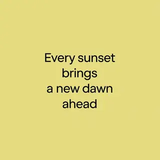 'Every sunset brings a new dawn ahead' written neatly on a p