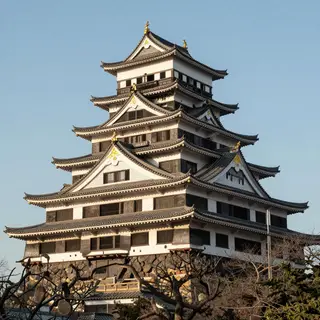 A medieval castle depicted in Japanese ukiyo-e woodblock pri
