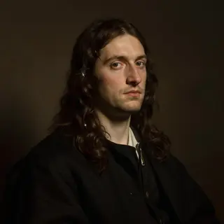 A portrait lit with classic Rembrandt lighting — triangle of